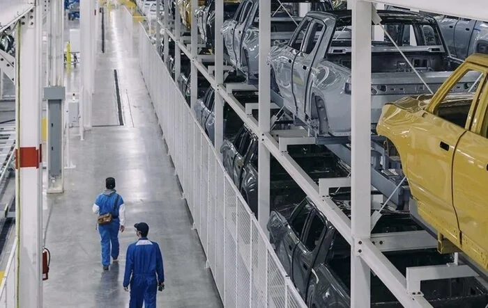 Compass Yellow R1T spotted on production line