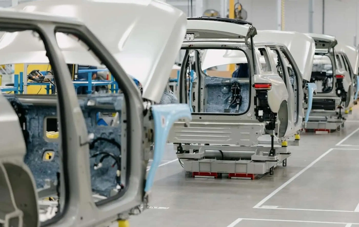 R2 Assembly Production Rate & Time Per Vehicle + Annual Capacity (and vs. R1)