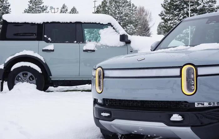 Limestone Rivian R1T vs Cactus Gray Ford Bronco