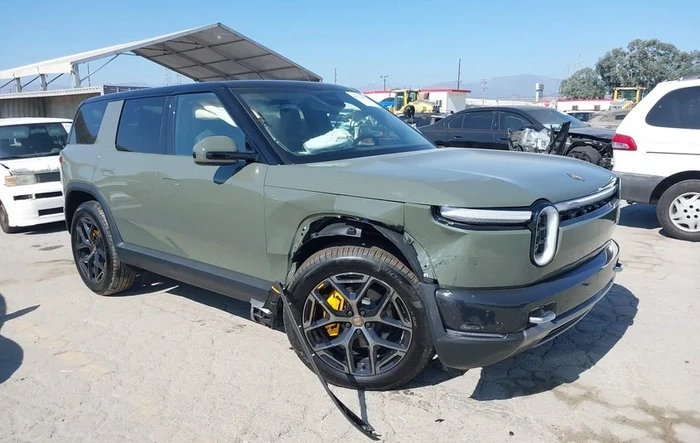 First Crashed R2 totaled with only 110 miles (VIN 1200)