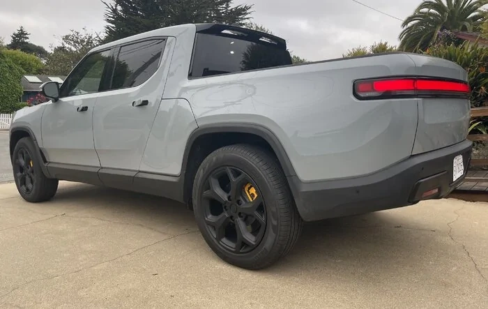 Modified: Matte black 21" wheels and matte black back bumper on R1T