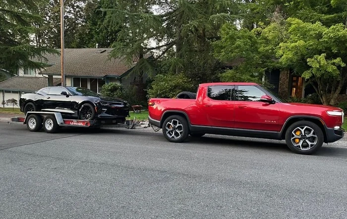 Towing a car (to and from the track) with R1T - my experience & report