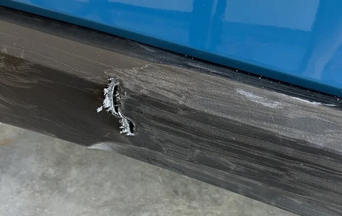 Fresh battle scar to my R1T from overlanding/off-roading weekend