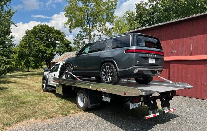 ? [UPDATE: R1S Delivered! First Reactions + Photos] Friday will be a good day -- scheduled R1S delivery date