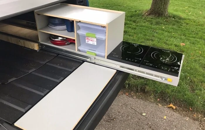Our home made design for a slide out camp kitchen