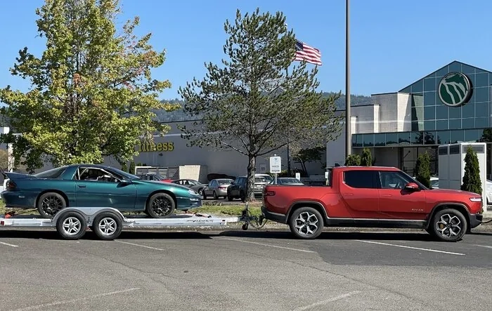 Another car towing report -- pulling trailer with R1T on 21s