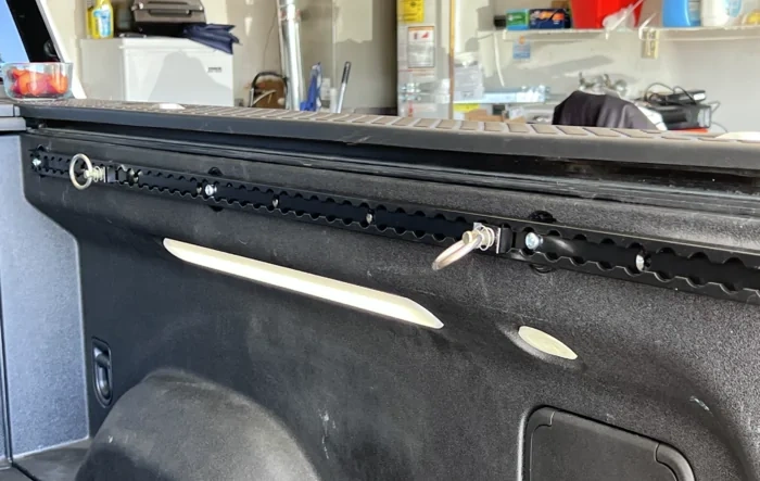 Installed S Track Tie Down Rails to Rivian R1T Bed