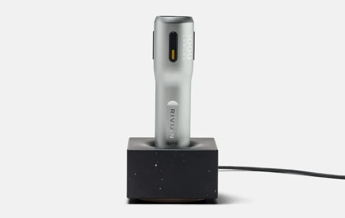 New Torch Flashlight and Charger Base ($225) in Rivian Gear Shop