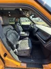 007 - Rivian_R1S_Interior_Front_Seats_From_Driver_Door.webp